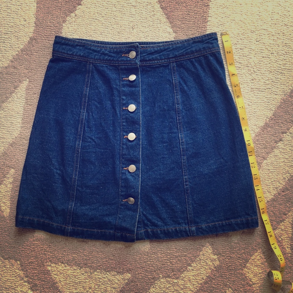 Denim skirt, button front.